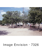 #7326 Picture Of A Health Official Walking Through A Beitbridge Rhodesian Campground During The Marburg Investigation Of 1975