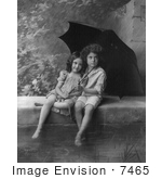 #7465 Stock Image of a Little Boy and Girl Under Umbrella in Rain by JVPD
