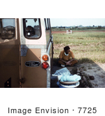 #7725 Picture Of Patient With Ebola-Like Symptoms Laying In The Back Of A Land Rover