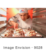 #9028 Picture Of Putting Cake In Refridgerator