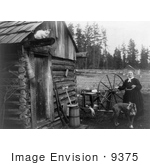 #9375 Picture Of A Woman Using A Spinning Wheel Outside