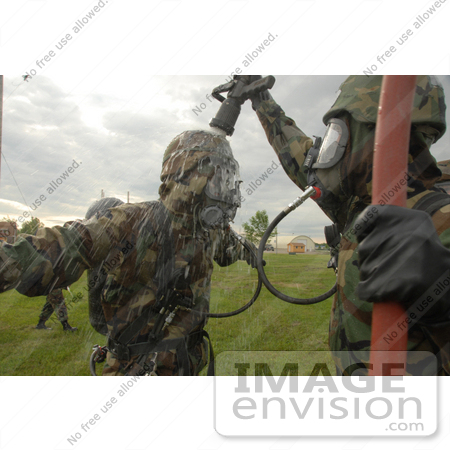 #11099 Picture of a Soldier Being Decontaminated by JVPD
