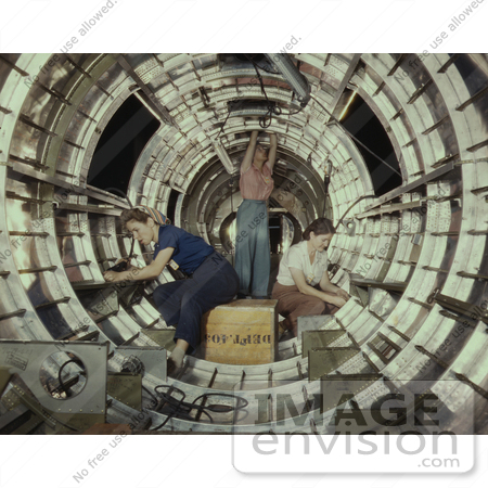 #1247 Photo of Three Women Riveters Working Inside a Circular Structure of the Fuselage by JVPD