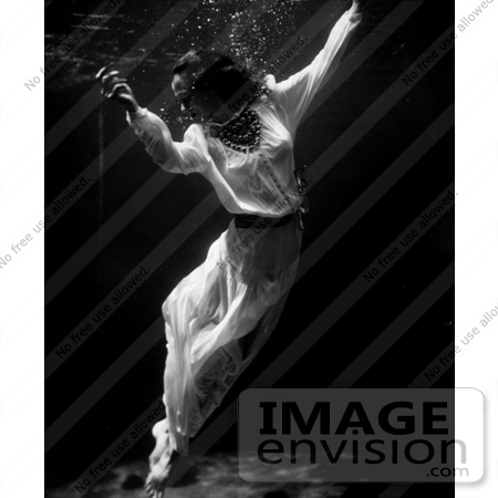 #13463 Picture of a Fashion Model Wearing a Dress Submerged Under Water by JVPD