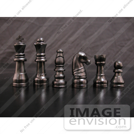 #139 Stock Image of Black Chess Pieces by Jamie Voetsch