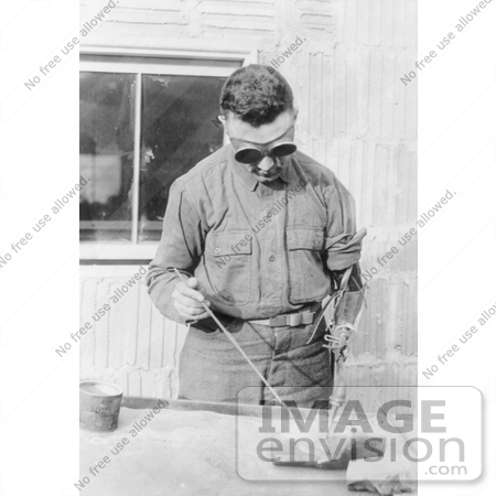 #1475 Photo of a Man With an Artificial Arm, Welding in 1919 by JVPD