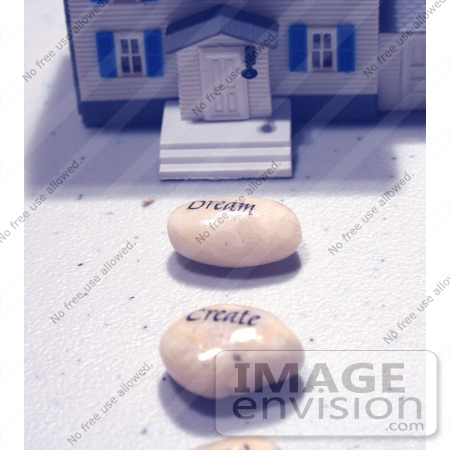 #153 Photo of Wishing Stones in Front of a Model House by Jamie Voetsch