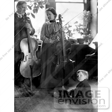 #16482 Picture of a Family of 3 With Parents Posed With Cellos and Son on the Floor by JVPD