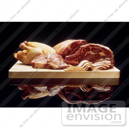 #17139 Picture of Red Meat, Bacon and Poultry on a Wooden Cutting Board by JVPD