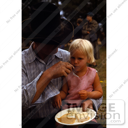 #17880 Photo of a Dad Feeding His Little Daughter by JVPD