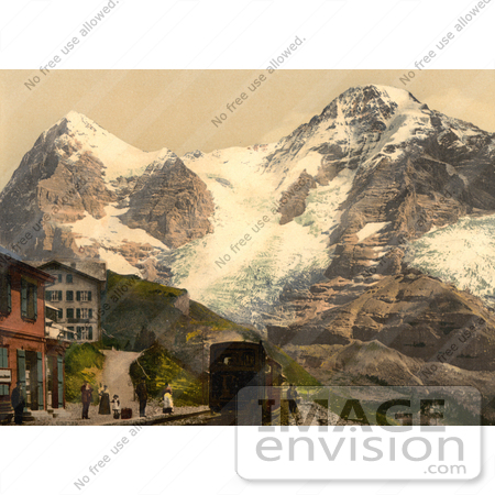 #17915 Picture of the Wengern Alp Railroad Train Station With Eiger and Monch Mountain, Switzerland by JVPD