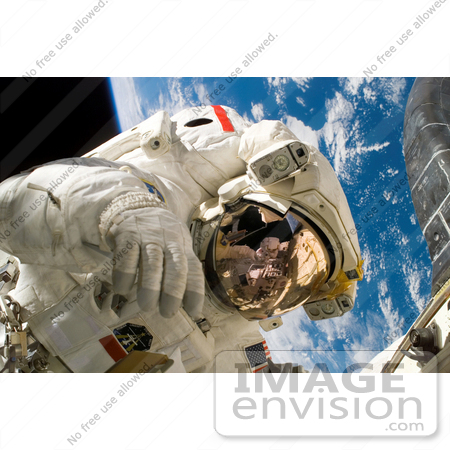 #18660 Stock Photo of Astronaut Piers John Sellers During a Space Walk on an STS-121 Mission by JVPD