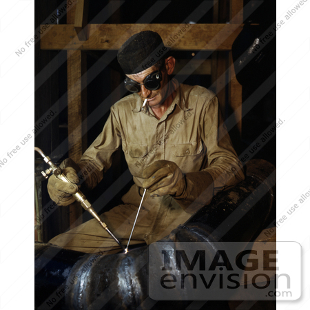 #19201 Photo of a Man Gas Welding a Joint in a Line of Spiral Pipe at the Douglas Dam by JVPD