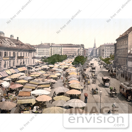 #19463 Stock Photo of Carriages and Trolleys Passing by the Naschmarkt in Vienna, Austria by JVPD