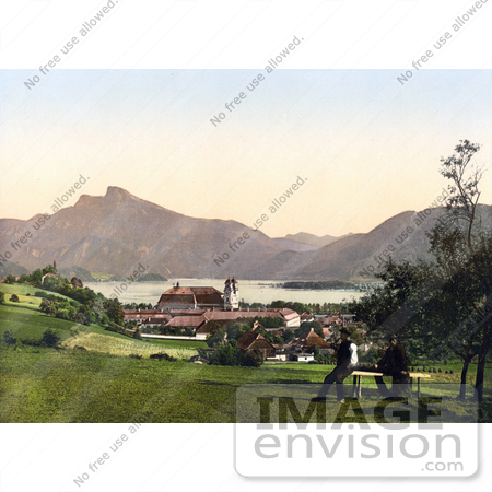 #19492 Photo of Two Men Overlooking the Schafberg Mountain and Collegiate Church in the Village of Mondsee on the Mondsee Lake, Upper Austria by JVPD