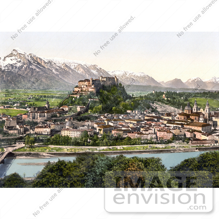 #19913 Stock Picture of the Salzach River Flowing Near the Fortress Hohensalzburg and the City of Salzburg in Austria by JVPD