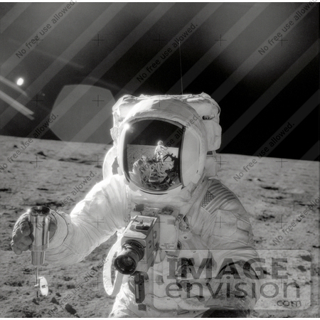 #19950 Stock Picture of Astronaut Alan LaVern Bean Collecting Samples on the Moon in 1969 by JVPD