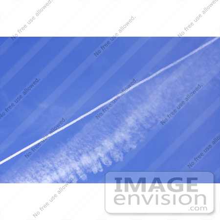 #200 Photo of Smoke Trails in a Blue Sky by Jamie Voetsch