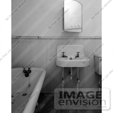 #20078 Stock Photography: Bathroom Sink, Toilet and Bath Tub Covered in Debri at the Ormond Hotel by JVPD