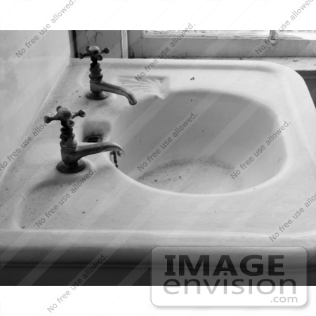 #20080 Stock Photography: Dirty Abandoned Porcelain Hand Sink in a Bathroom by JVPD