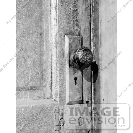 #20102 Stock Photo: Door Knob and Skeleton Keyhole on a Door by JVPD