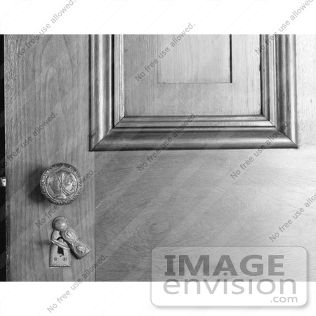 #20113 Stock Photo: Door Paneling, Knob and Open Key Plate With Skeleton Key Inside by JVPD