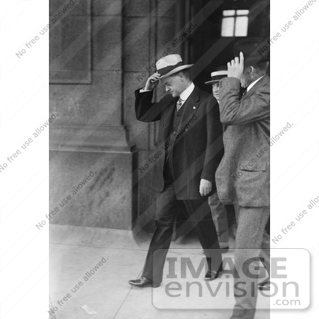 #20296 Historical Stock Photo: President Herbert C Hoover Walking and Holding Onto His Hat by JVPD