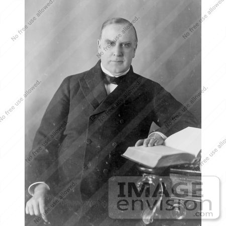 #20317 Historical Stock Photo of the 25th American President, William McKinley, Seated and Resting His Hand on an Open Book by JVPD