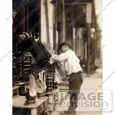 #20512 Historic Stock Photography of a 12 Year Boy Shoeshining a Man’s Shoes on a Sidewalk, 1910 by JVPD