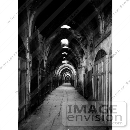 #20806 Stock Photography of a Cobbled Hallway and Closed Shops by JVPD
