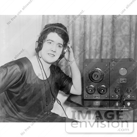 #20811 Stock Photography of a Woman Wearing Radio Headphones by JVPD