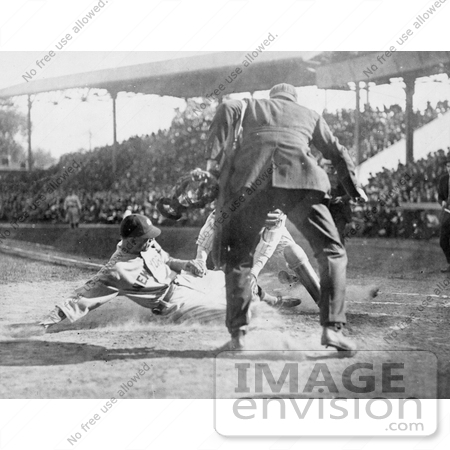 #21153 Stock Photography of a Baseball Umpire Prepared to Make the Call as a Catcher Tags a Runner by JVPD