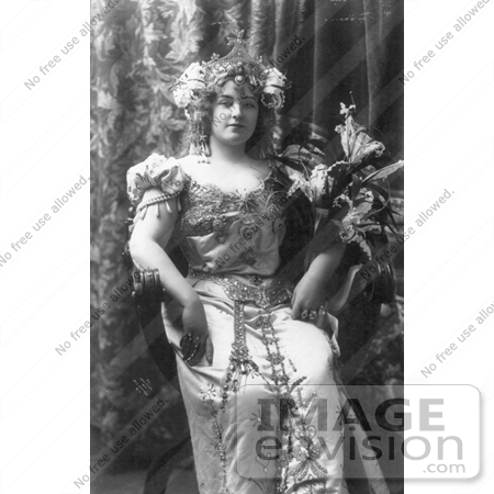 #21185 Stock Photography of Lillian Russell Sitting in a Chair, Wearing a Beautiful Gown and Crown by JVPD