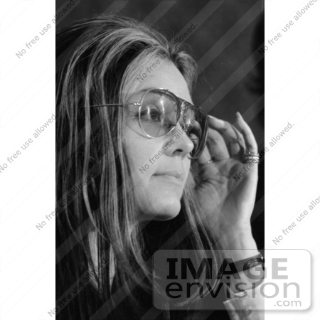 #21192 Stock Photography of Gloria Steinem Adjusting Her Glasses During a News Converence for Women’s Action Alliance by JVPD