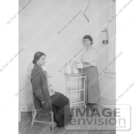 #21270 Stock Photography of Margaret Sanger, Founder of Planned Parenthood, With a Woman in an Exam Room by JVPD
