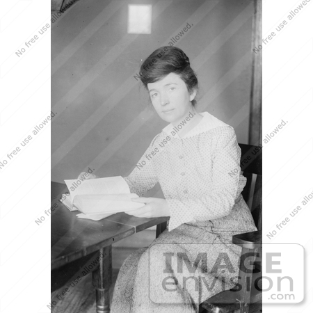 #21275 Stock Photography of Margaret Sanger, Founder of Planned Parenthood, Reading a Book at a Desk by JVPD