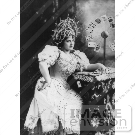 #21316 Stock Photography of Lillian Russell in a Dress and Crown, Sitting at a Table With Cards by JVPD
