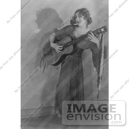 #21338 Stock Photography of Gladys Louise Smith, Known as Mary Pickford, Playing a Guitar in Rosita by JVPD