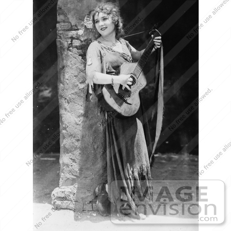 #21345 Stock Photography of Gladys Louise Smith, Known as Mary Pickford, Strumming a Guitar in Rosita by JVPD