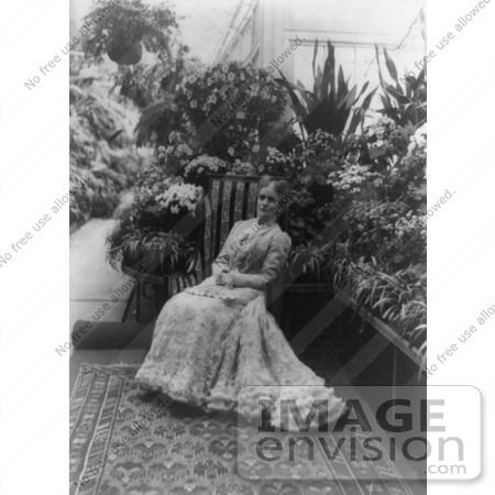 #21398 Stock Photography of First Lady Ida Saxton McKinley in a Gown, Holding a Hand Fan in Her Lap, Sitting in a Garden by JVPD