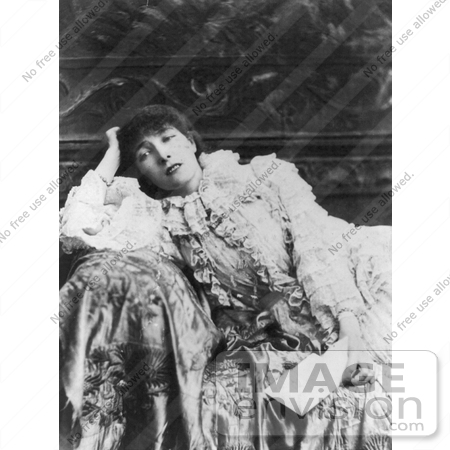 #21408 Stock Photography of the Actress Sarah Bernhardt Holding a Letter and Leaning Against the Arm of a Sofa by JVPD