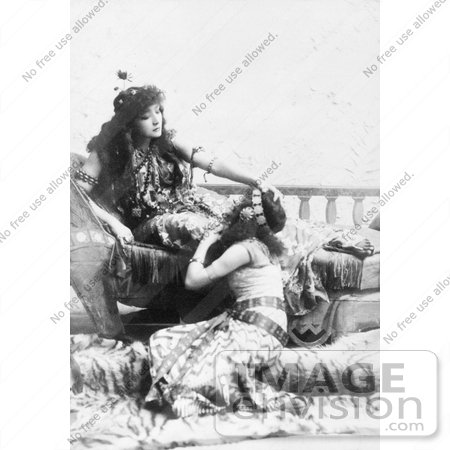 #21409 Stock Photography of the Actress Sarah Bernhardt on a Sofa, Resting Her Hand on a Servants Head by JVPD