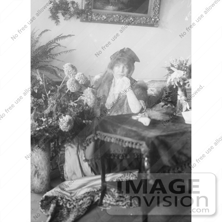#21425 Stock Photography of the Actress Sarah Bernhardt Holding a Hanky, Sitting Behind a Table by JVPD