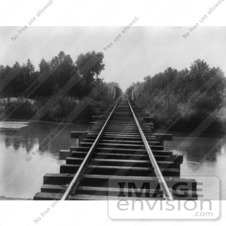 #21429 Stock Photography of Train Tracks at the Southern Pacific Railroad Bridge Over the Calloway Canal in Kern County, California by JVPD