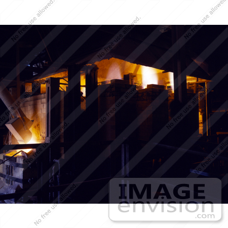 #21433 Historical Stock Photography of Heat of a Gas Fired Glass Furnace Melting the Compounded Batch for Fiberglass Insulation by JVPD