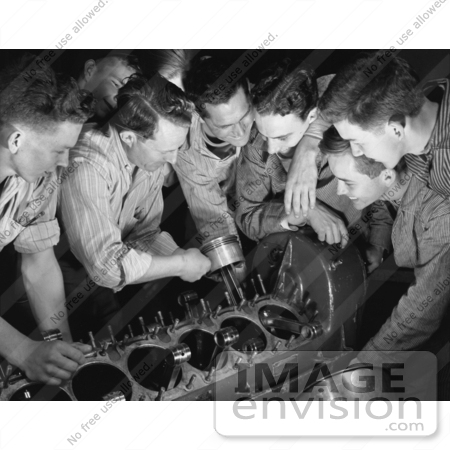 #21435 Stock Photography of an Instructor Teaching a Class of Students How to Assemble an Airplane Engine by JVPD