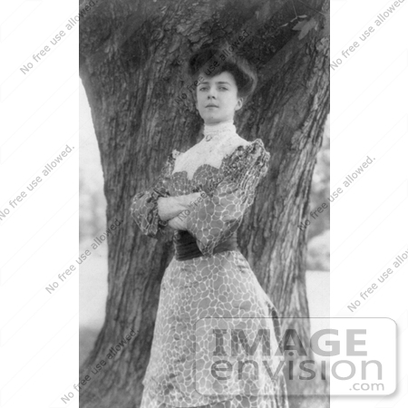 #21454 Stock Photography of Alice Roosevelt Longworth Standing in Front of a Tree With Her Arms Folded by JVPD