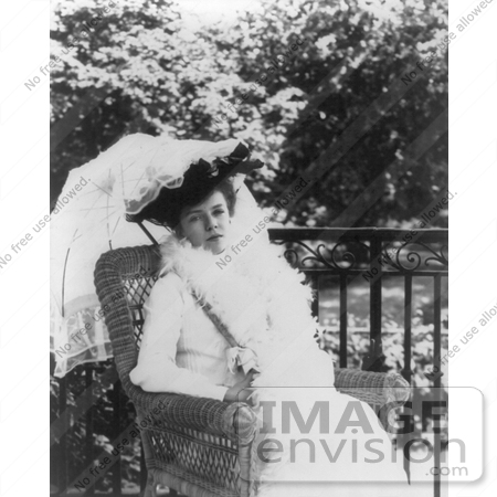 #21458 Stock Photography of Alice Roosevelt Longworth Sitting in a Wicker Chair and Holding an Umbrella by JVPD