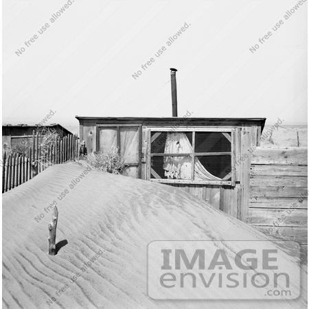 #21599 Stock Photography of a Large Pile of Sand in Front of an Outhouse in Oklahoma, 1936 by JVPD