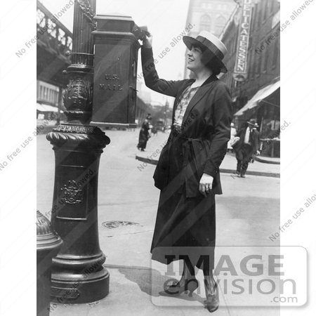 #21602 Stock Photography of Merle Alcock Sending Off Mail at a Mailbox in New York City by JVPD